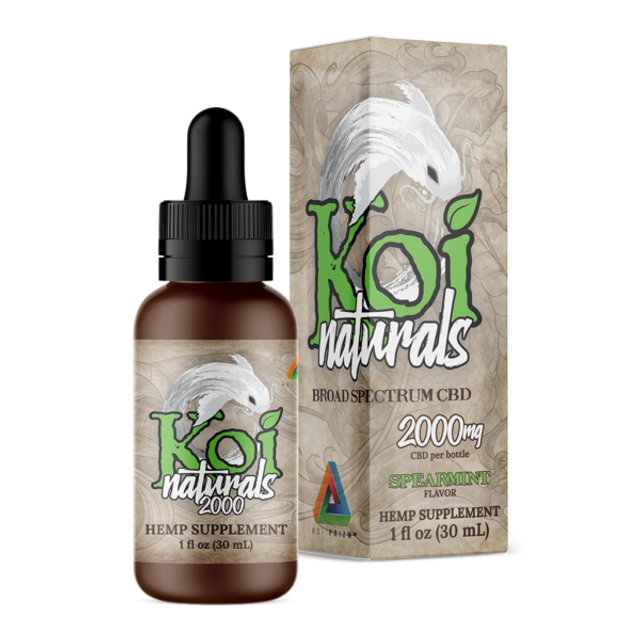 A Koi Naturals spearmint flavored tincture with 2000mg CBD and its packaging